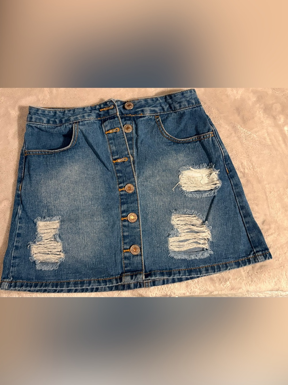 High-Rise Distressed Blue Denim Skirt with Button Front